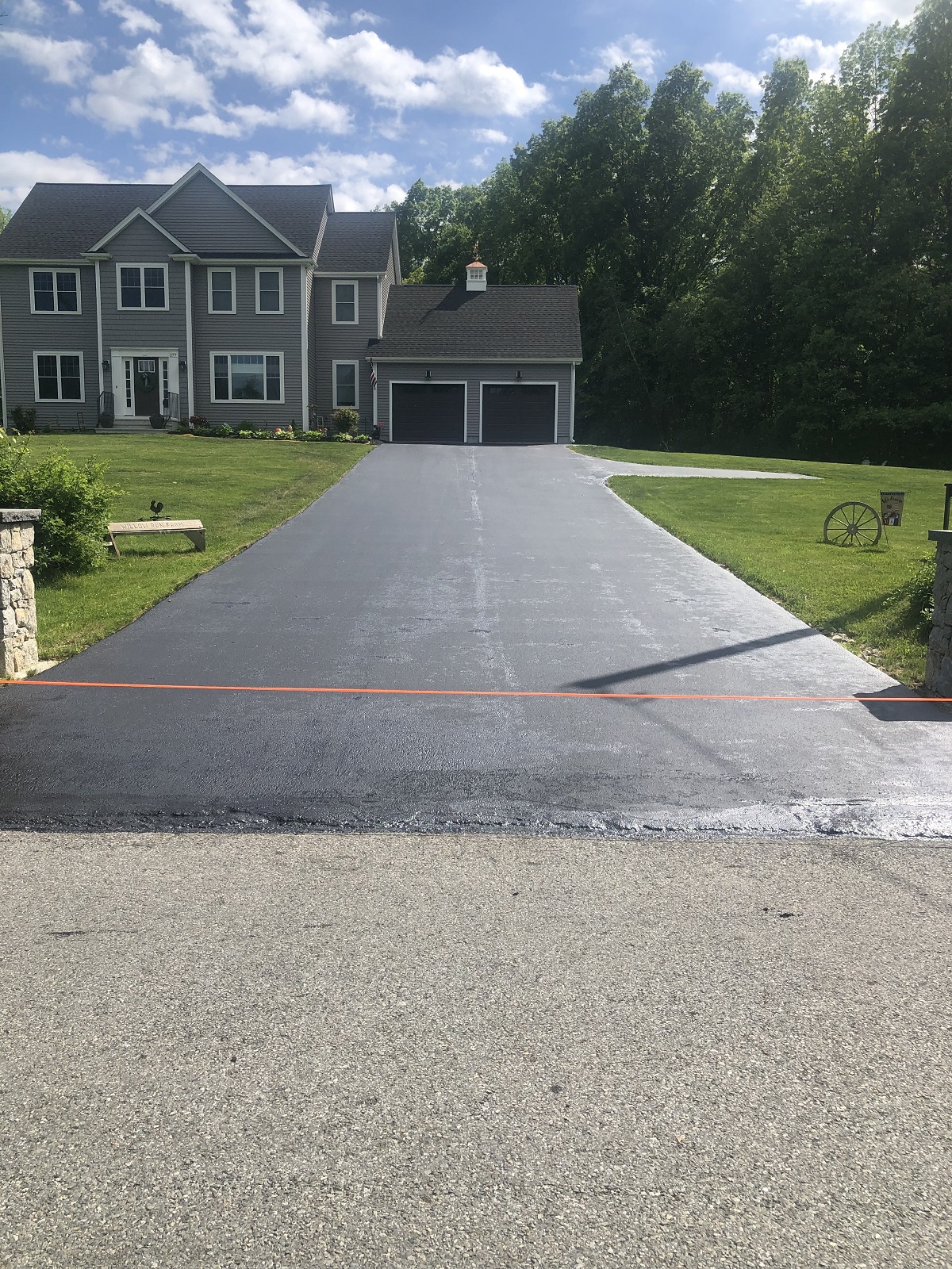 Beautiful residential driveway after sealcoating